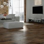 Gray Sofa Set In The Set Up In Wood Flooring - Laminate Flooring Solutions - Woodland Lifestyle